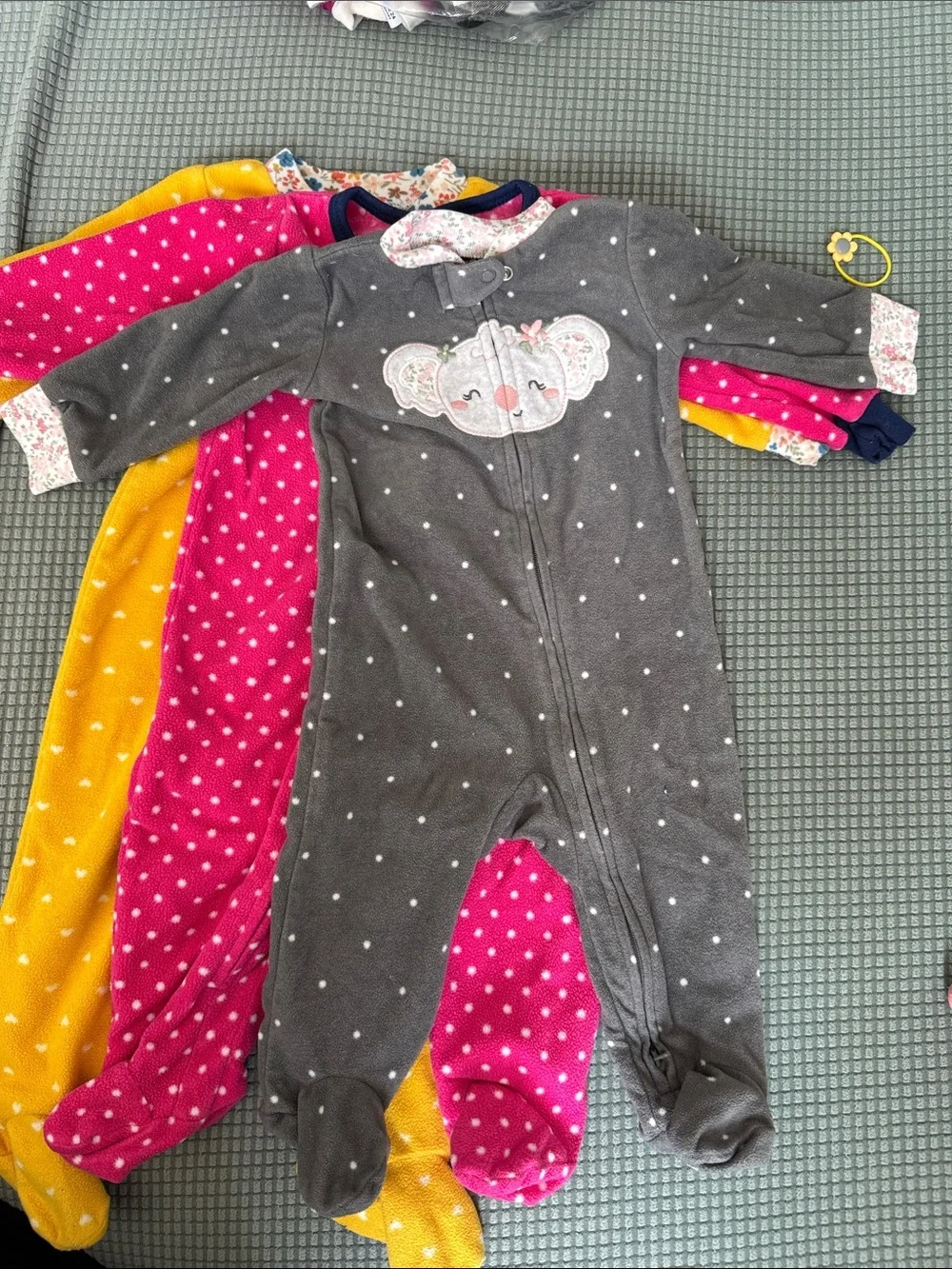 Baby Girls' 4 One-Piece Footed onesie size 6-9M.